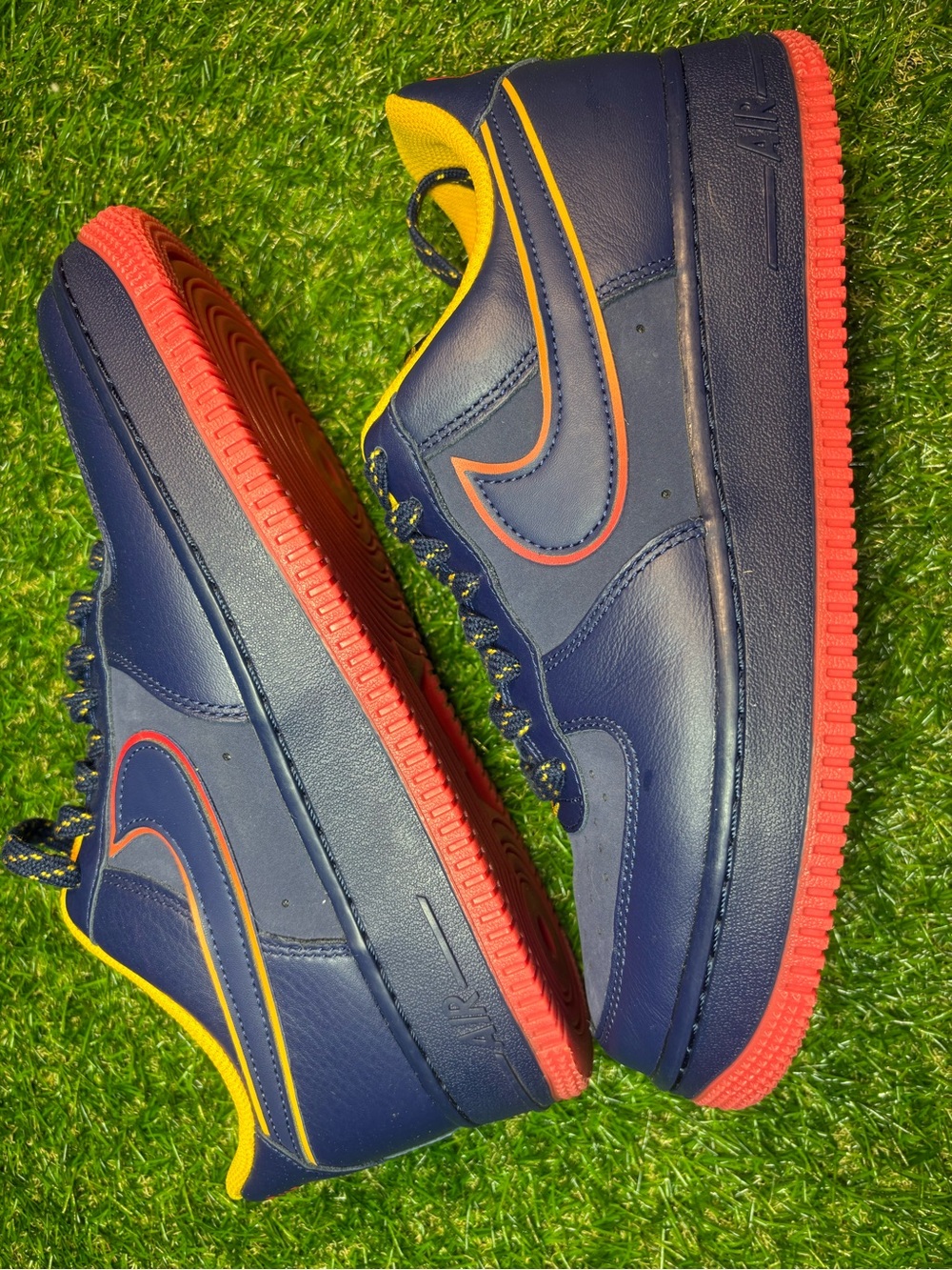 2007 Nike Air Force’s Low-Top in Navy with Red and Yellow men’s 8.5, women’s 10